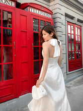 Halter Neck Silk Midi Dress with Front Slit and Back Bow Detail